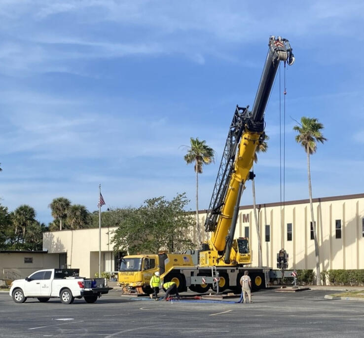 Rigging a larger chiller out of the building